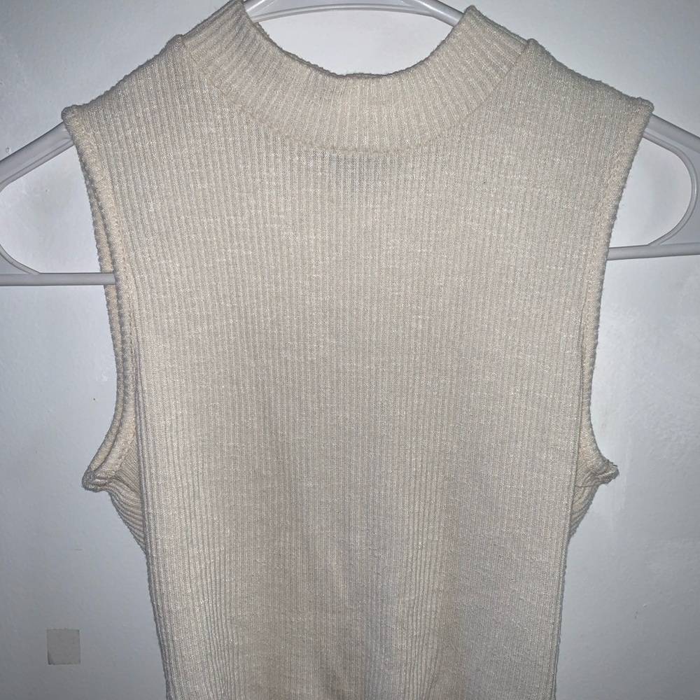 Cream ribbed cropped turtle neck top